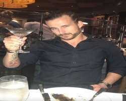 Adam Cole consuming alcohol